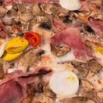 “È quella dove fanno le pizze enormi”, chiunque ci va non riesce a finirla | È in buco nel centro di Catania